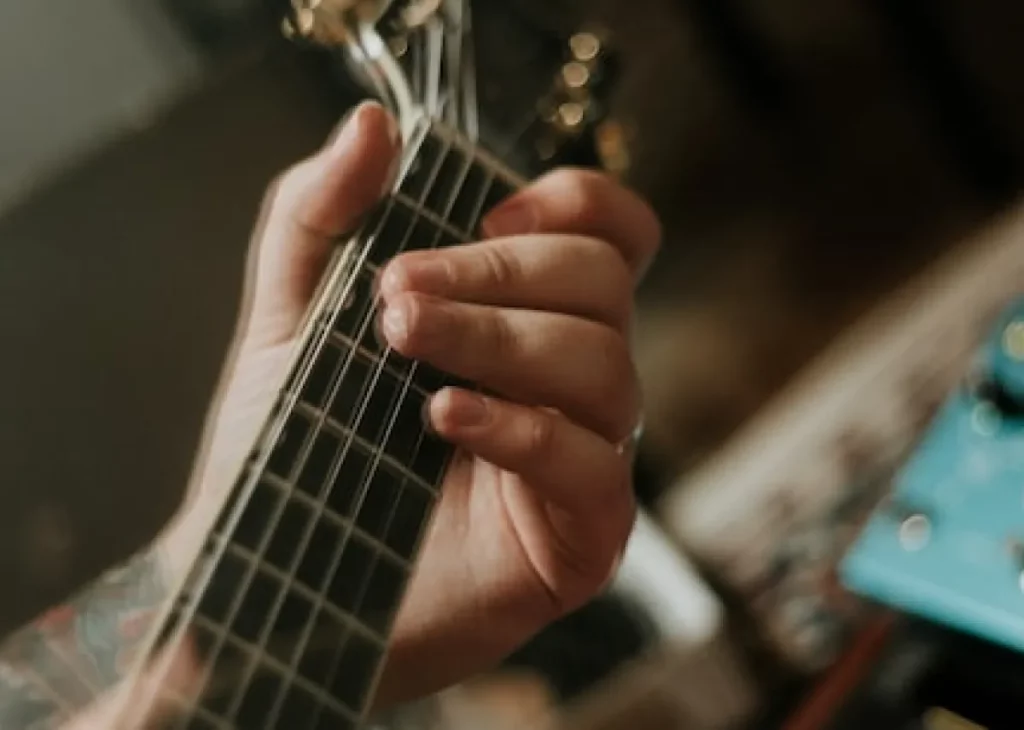 man playing guitar