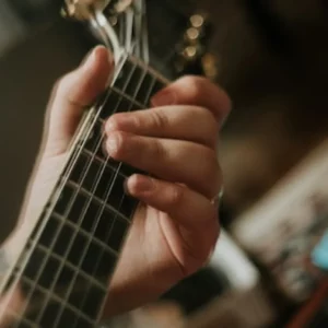man playing guitar